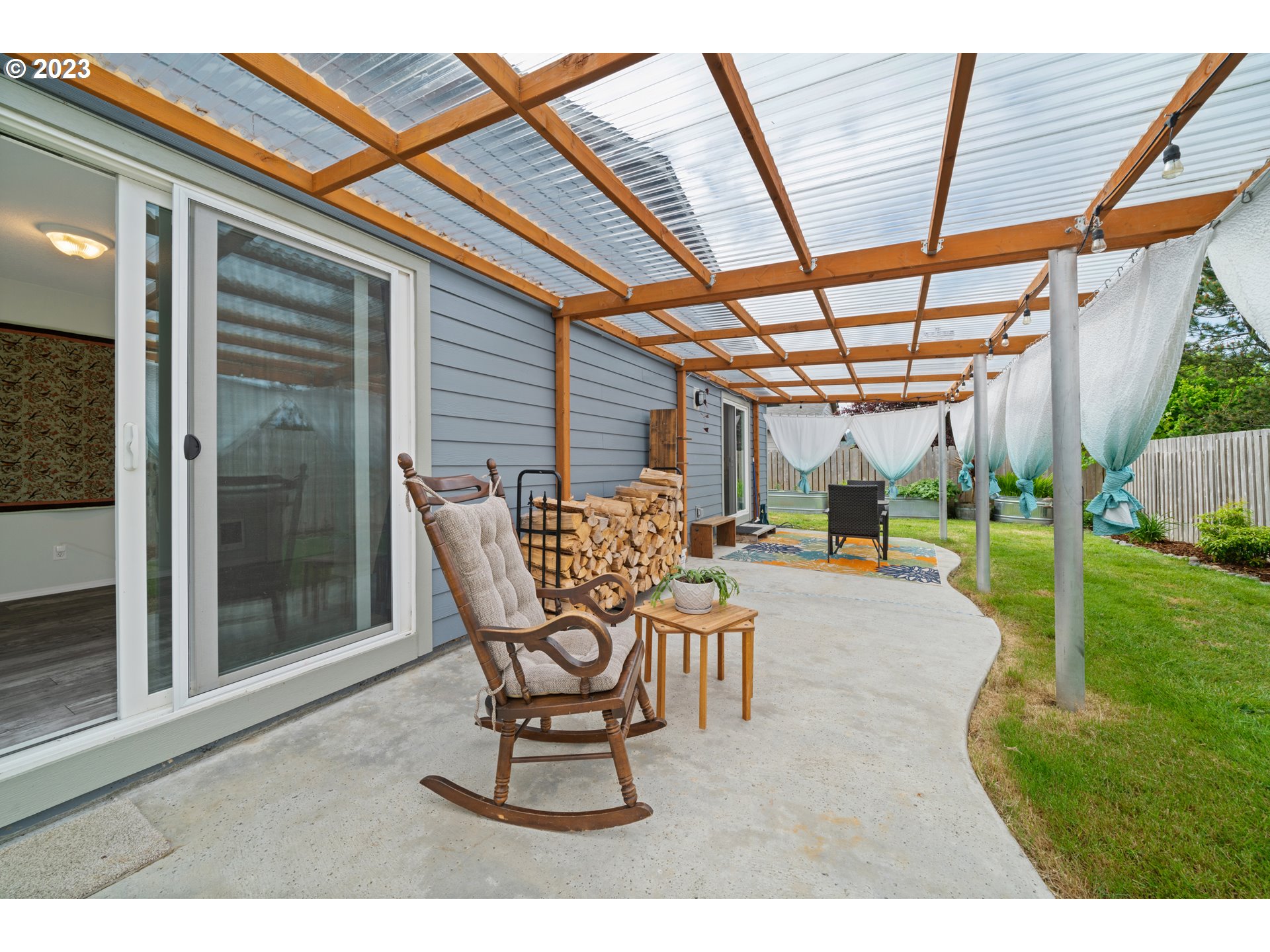 34100 Pintail Avenue Nehalem, OR 97131 - Photo 23 of 31 a building outdoor space with patio furniture and garden view