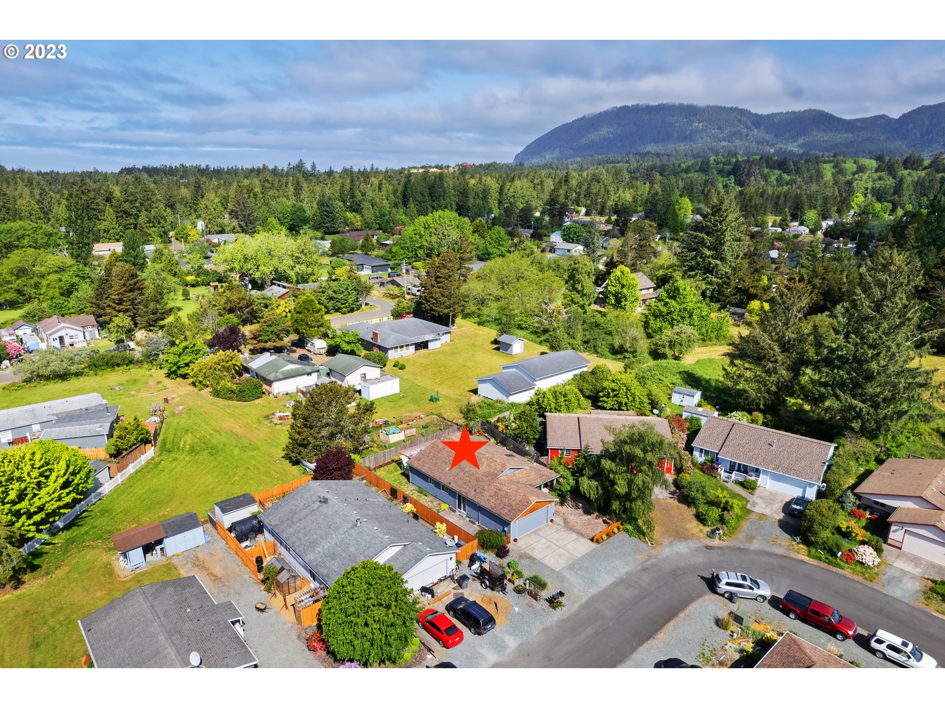 34100 Pintail Avenue Nehalem, OR 97131 - Photo 3 of 31 an aerial view of residential house with outdoor space and lake view