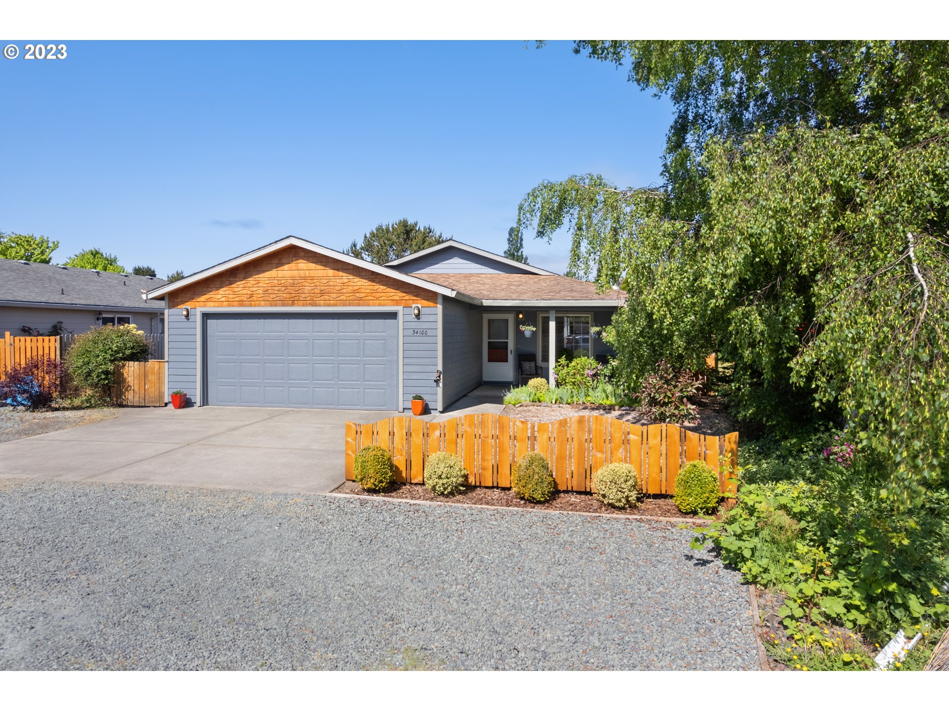 34100 Pintail Avenue Nehalem, OR 97131 - Photo 31 of 31 a front view of a house with a yard