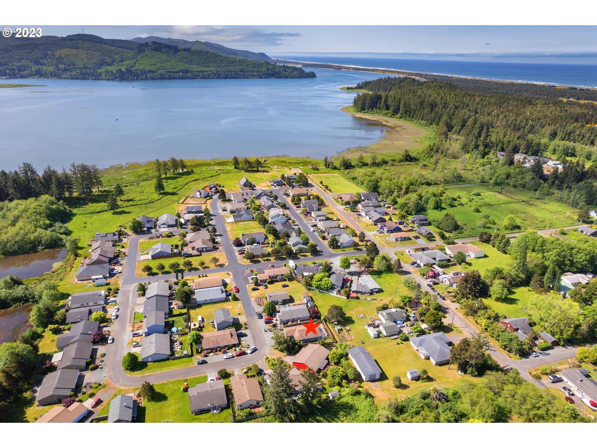 34100 Pintail Avenue Nehalem, OR 97131 - Photo 4 of 31 a view of a lake
