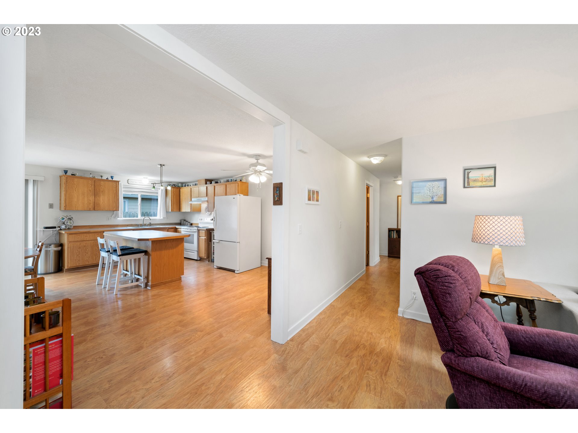 34100 Pintail Avenue Nehalem, OR 97131 - Photo 9 of 31 a living room with furniture and view of kitchen