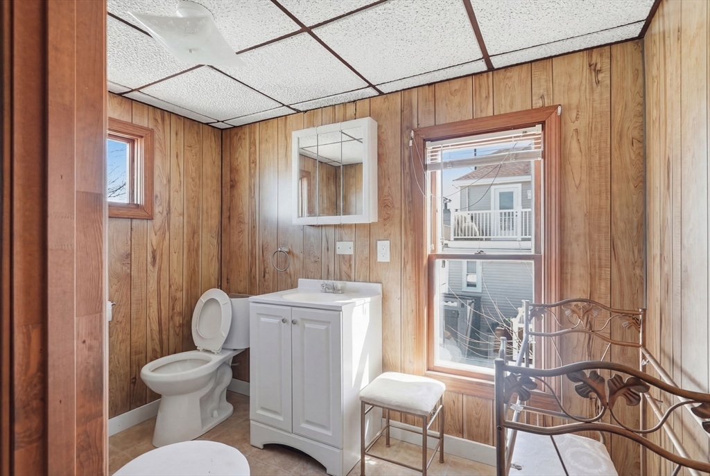 1080 Shirley Street Winthrop, MA 02152 - Photo 15 of 21 a bathroom with a toilet a sink and a shower