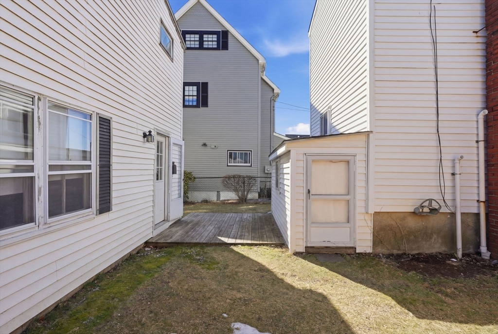1080 Shirley Street Winthrop, MA 02152 - Photo 19 of 21 a view of a back yard of the house