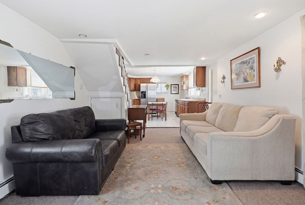 1080 Shirley Street Winthrop, MA 02152 - Photo 5 of 21 a living room with furniture and a couch