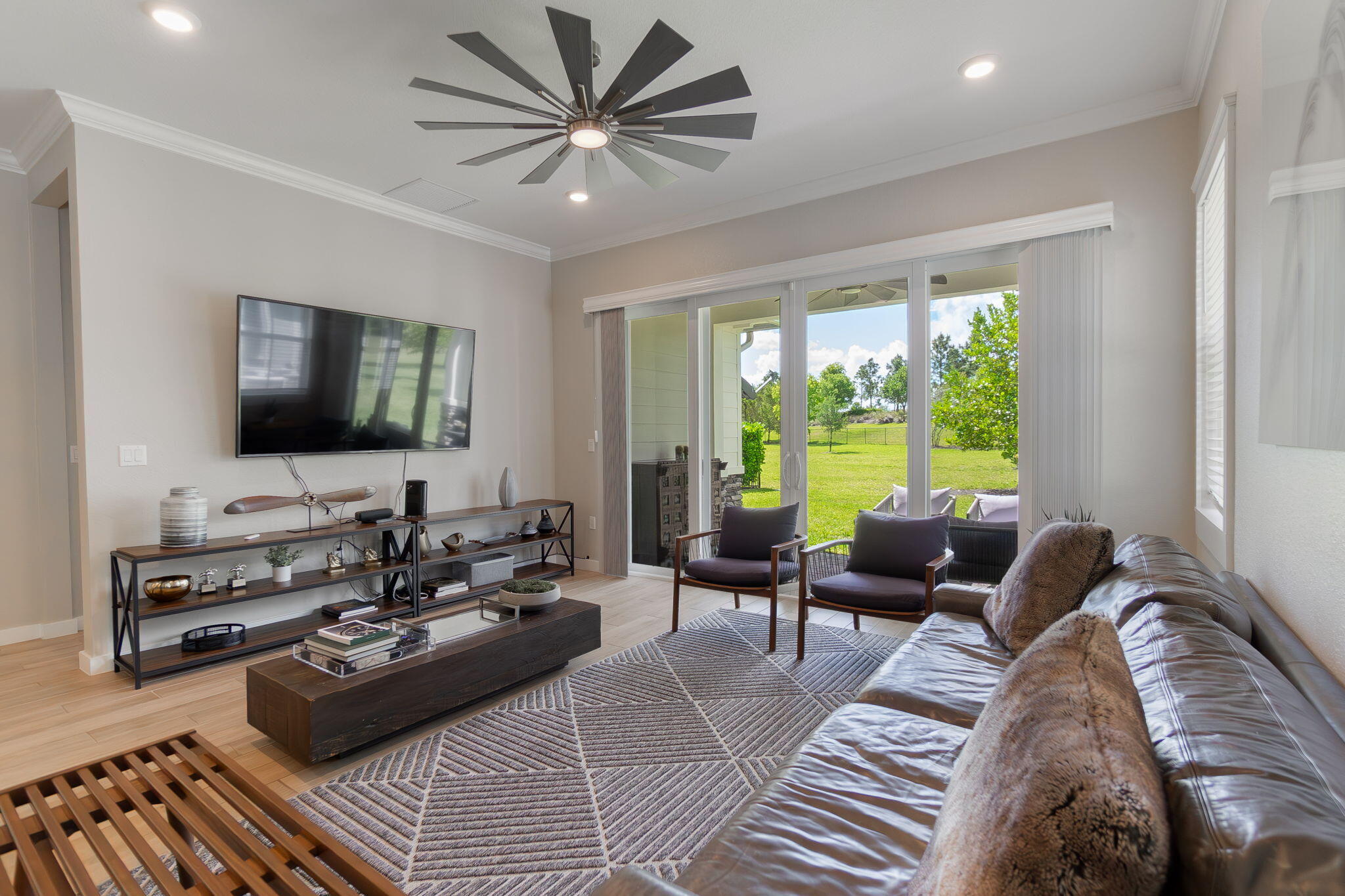 19546 Weathervane Way Loxahatchee, FL 33470 - Photo 23 of 63 a living room with furniture and a flat screen tv