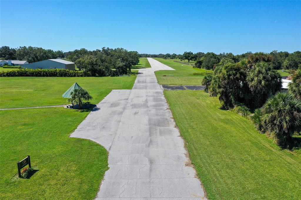4674 Hidden River Road Sarasota, FL 34240 - Photo 39 of 46 a view of a park with large trees