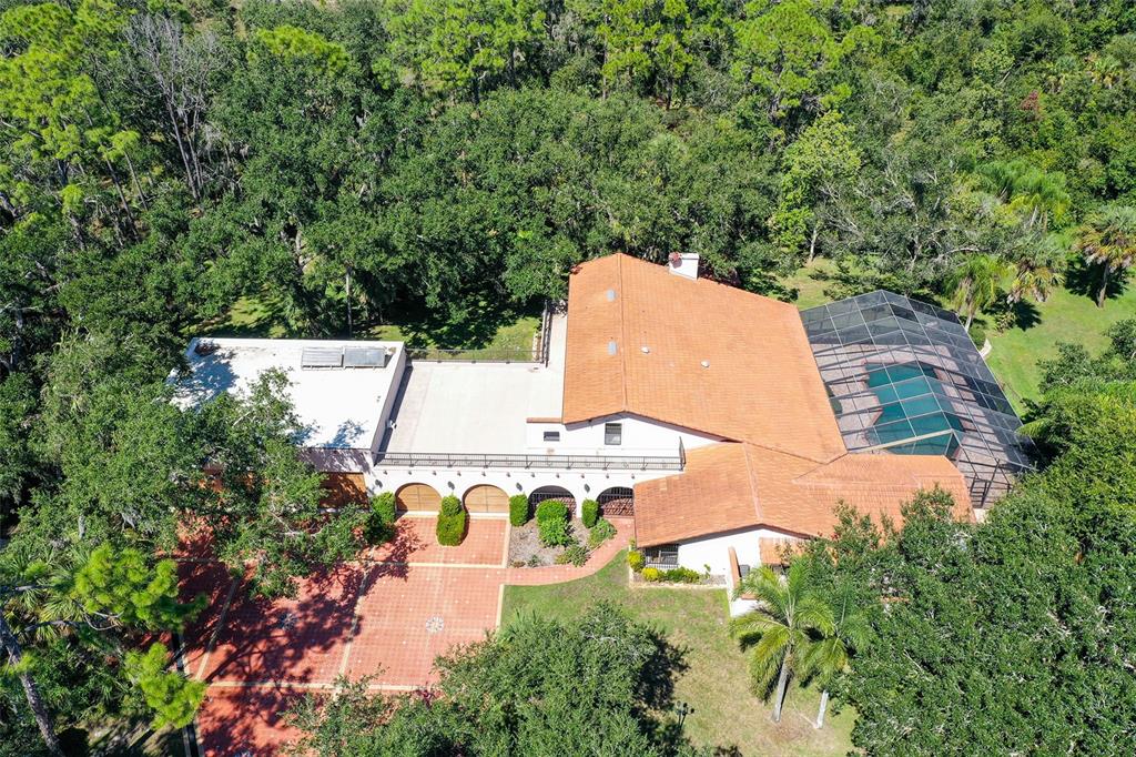 4674 Hidden River Road Sarasota, FL 34240 - Photo 46 of 46 an aerial view of a house with yard swimming pool and outdoor seating