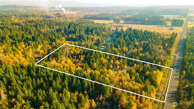 a view of a balcony with an outdoor space and seating area