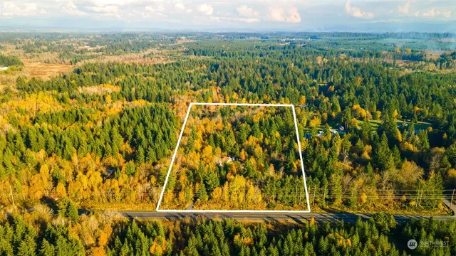 a view of a yard with an outdoor space