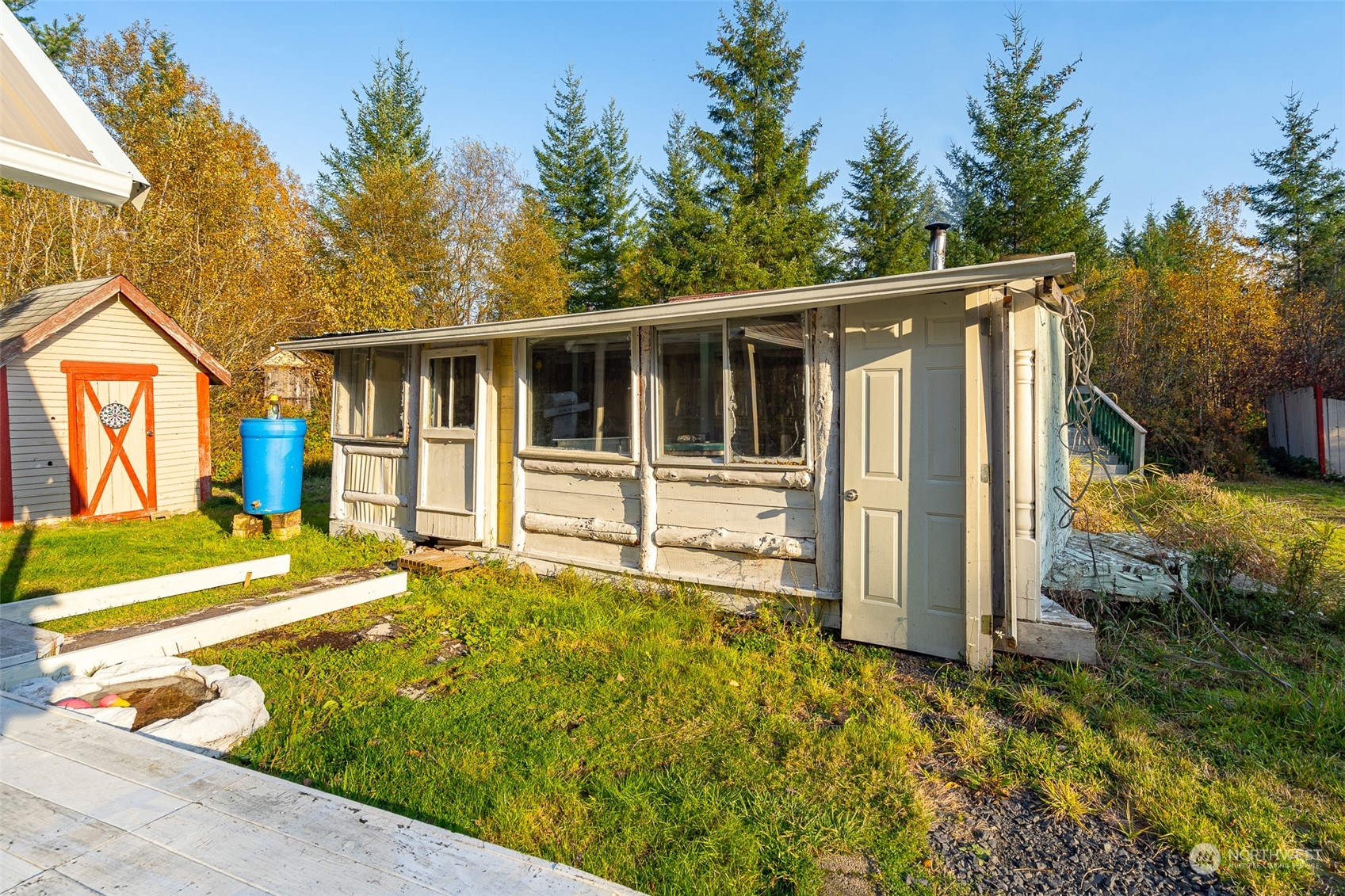207 Meier Road Winlock, WA 98596 - Photo 33 of 33 a view of a house with backyard outdoor seating area and garden