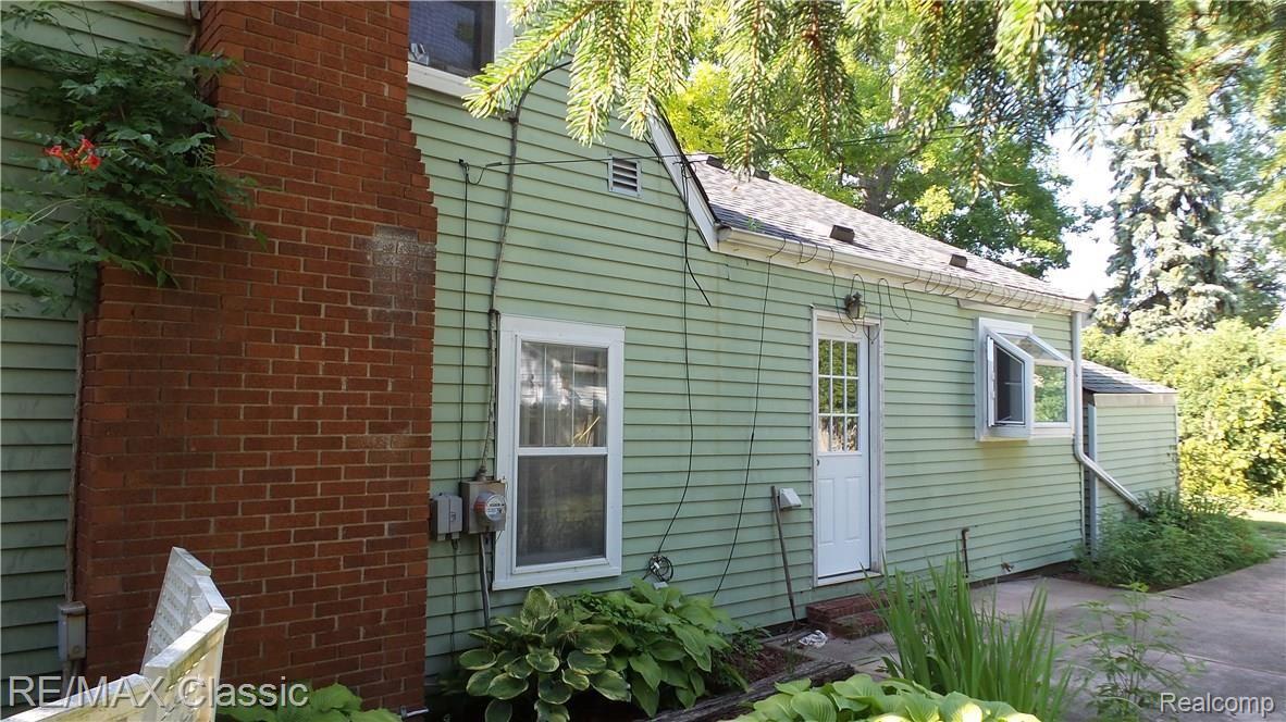 755 Rickett Road Brighton, MI 48116 - Photo 15 of 18 755 Rickett exterior chimeny.jpg