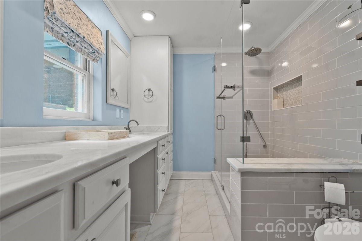 209 Fairway Road Cheraw, SC 29520 - Photo 16 of 48 a bathroom with a sink a toilet and shower