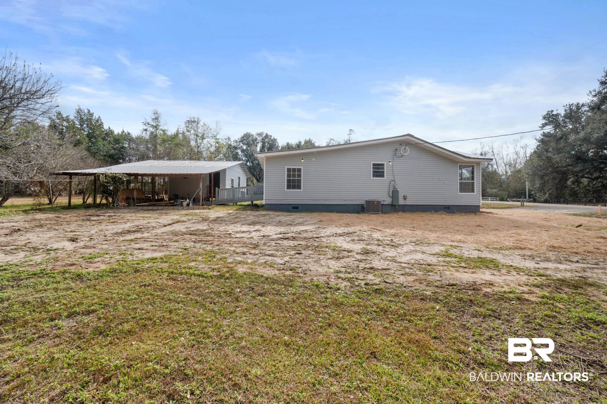 35780 Spring Road North Stapleton, AL 36578 - Photo 41 of 41 Rear view of property with crawl space and a carport