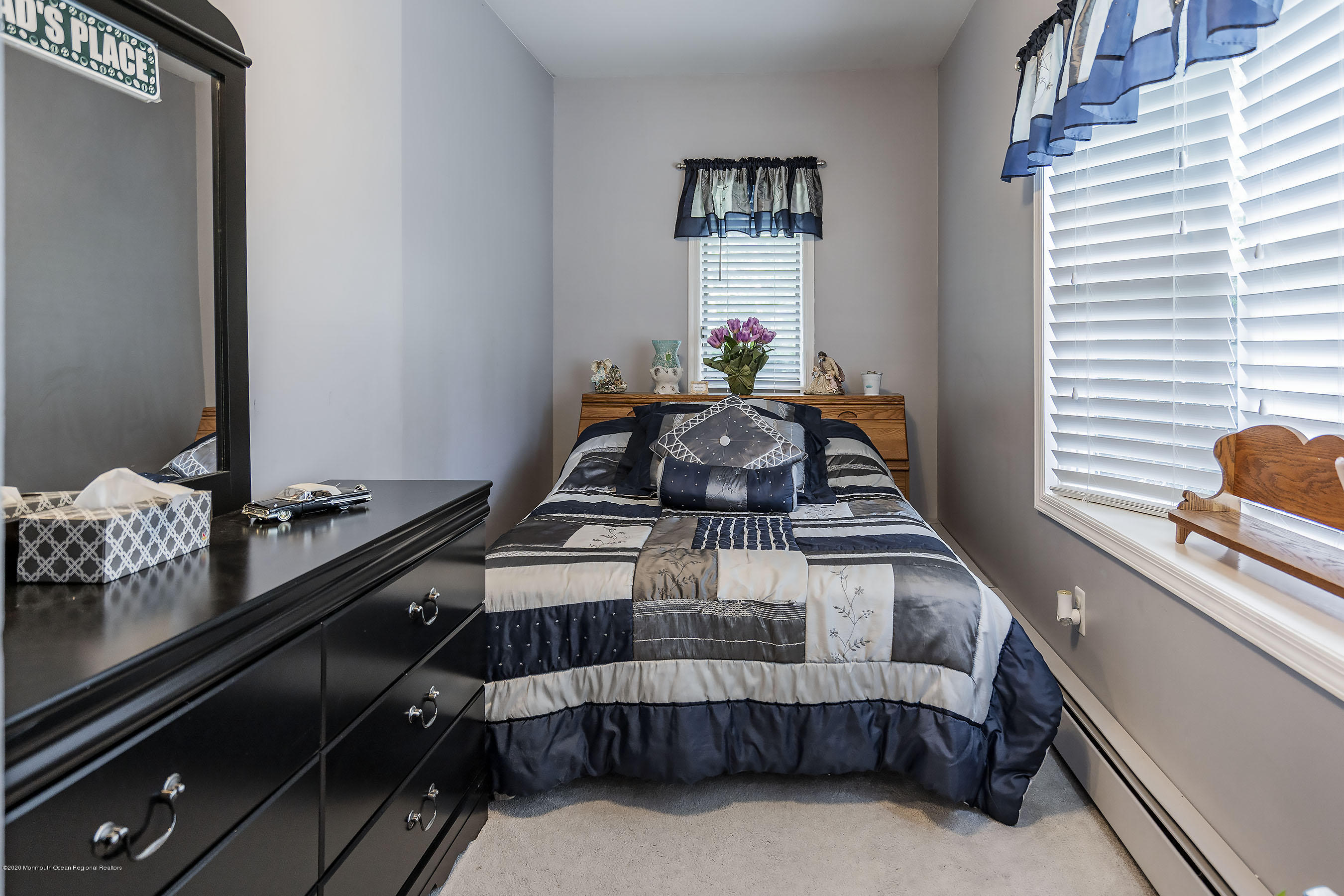 7 Wooleytown Road Morganville, NJ 07751 - Photo 18 of 30 a bedroom with bed and window