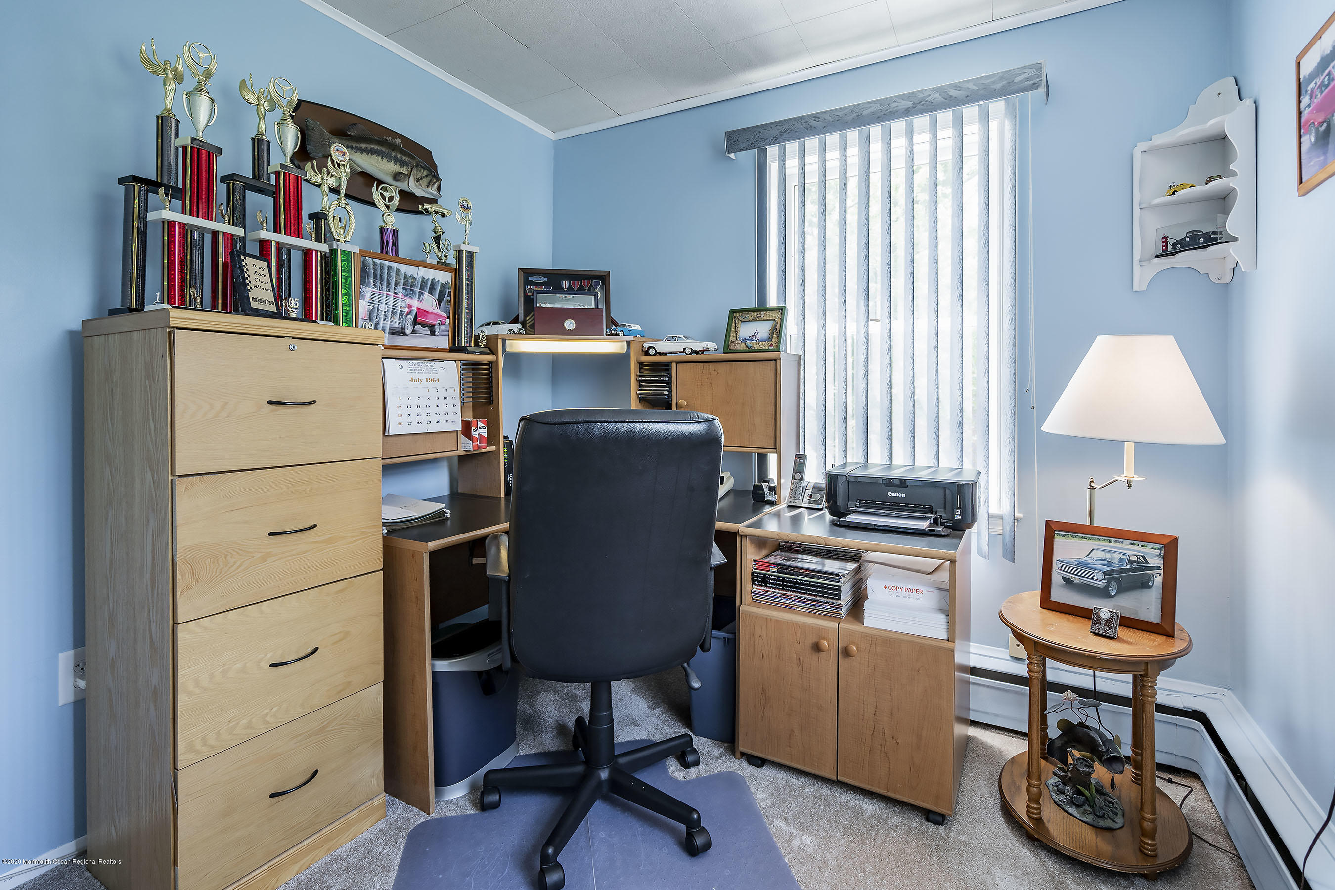 7 Wooleytown Road Morganville, NJ 07751 - Photo 20 of 30 a view of a workspace with furniture and a window