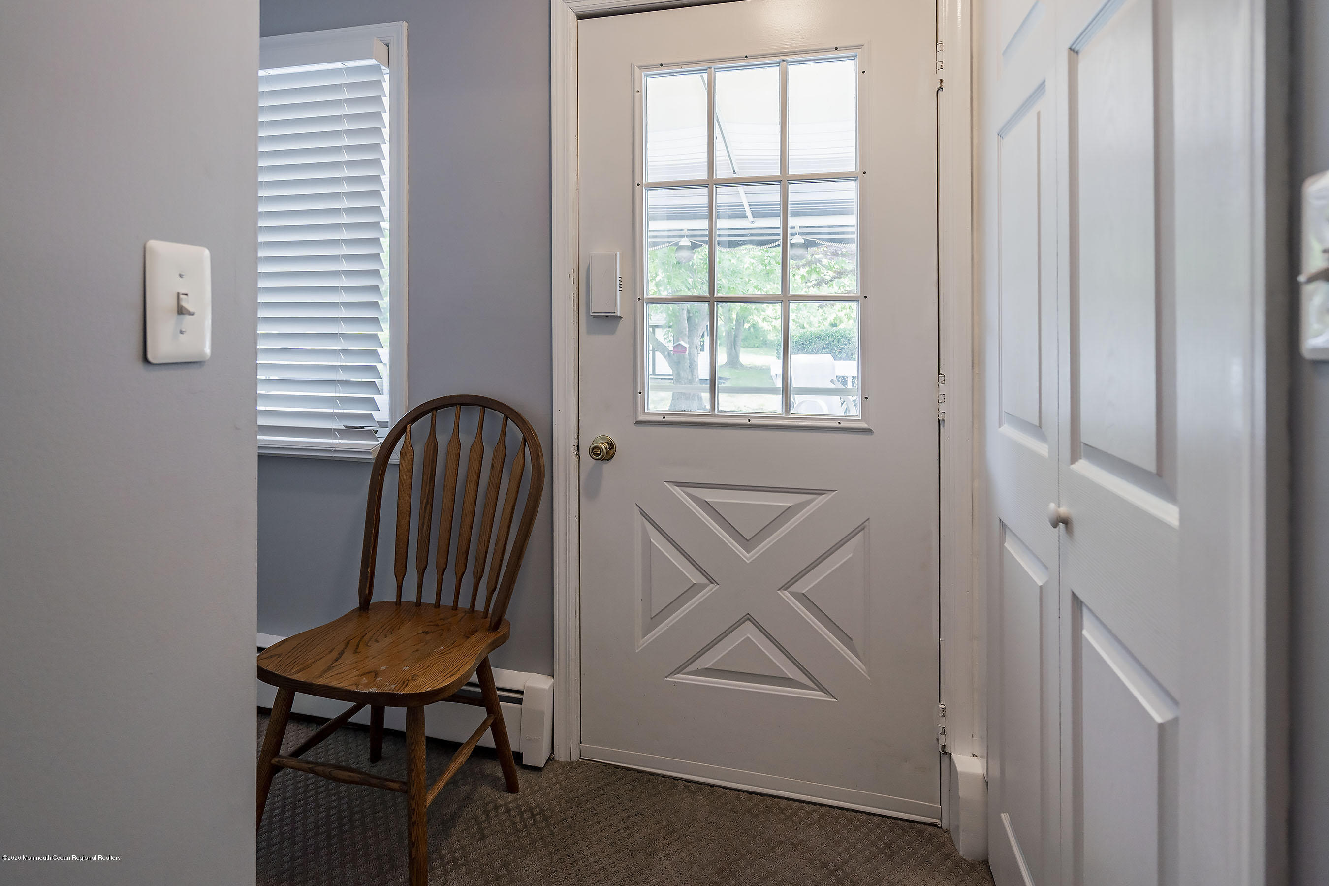 7 Wooleytown Road Morganville, NJ 07751 - Photo 22 of 30 a view of a room that has a table and chair