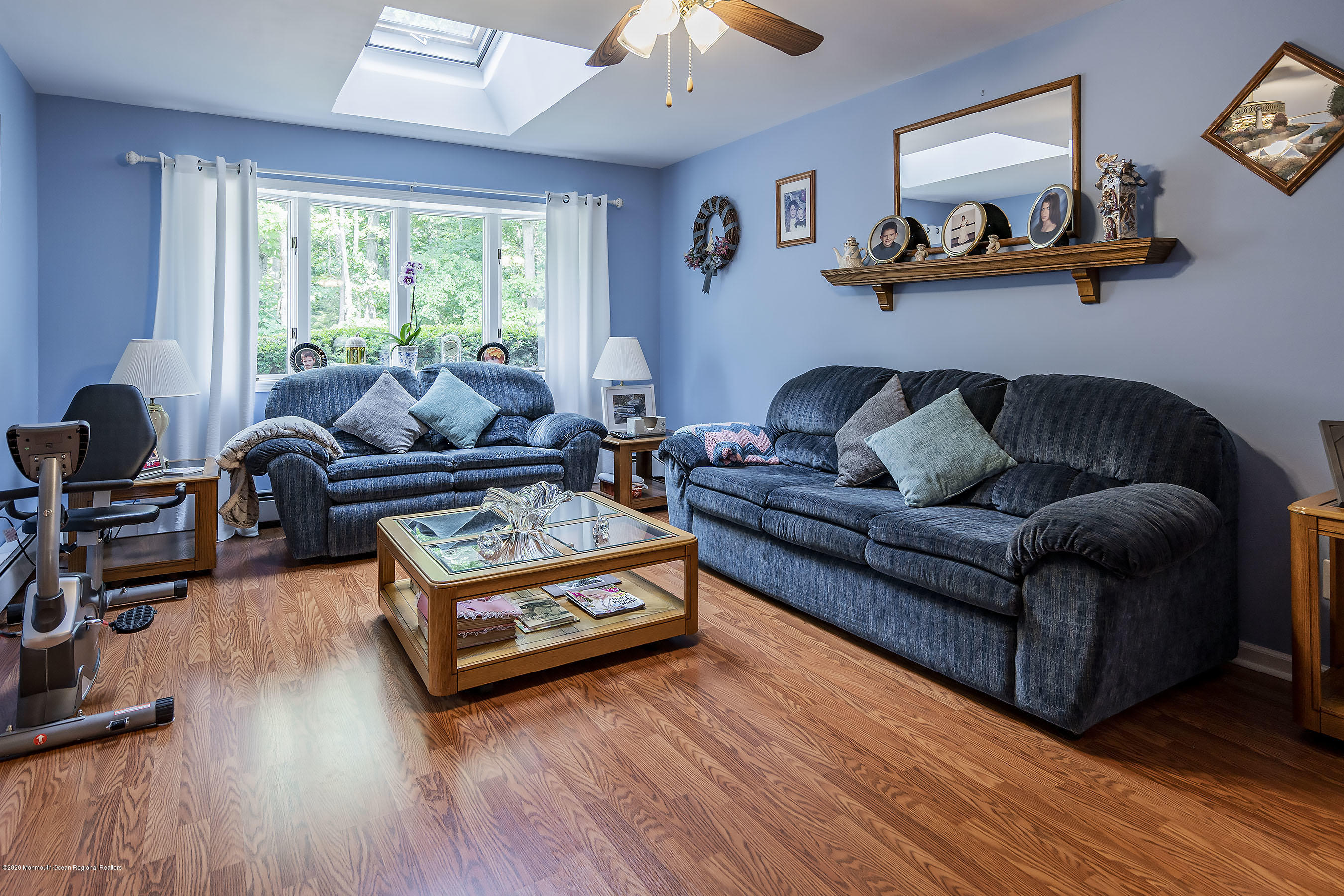 7 Wooleytown Road Morganville, NJ 07751 - Photo 7 of 30 a living room with furniture and a large window