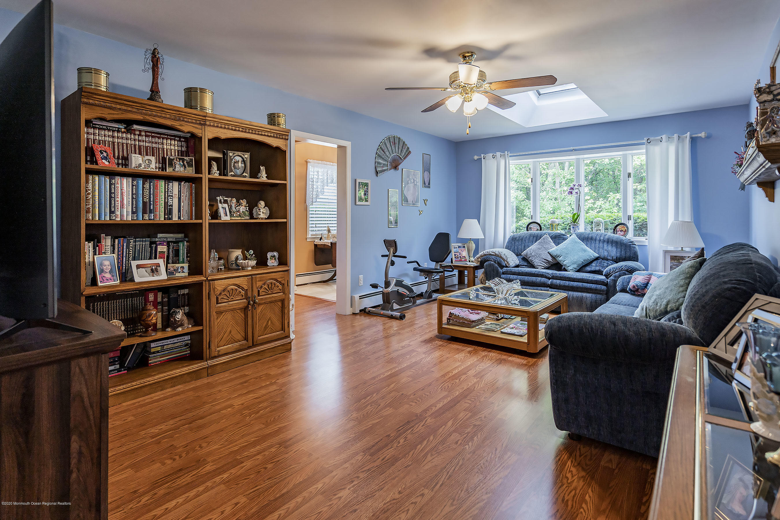 7 Wooleytown Road Morganville, NJ 07751 - Photo 8 of 30 a living room with furniture and a large window