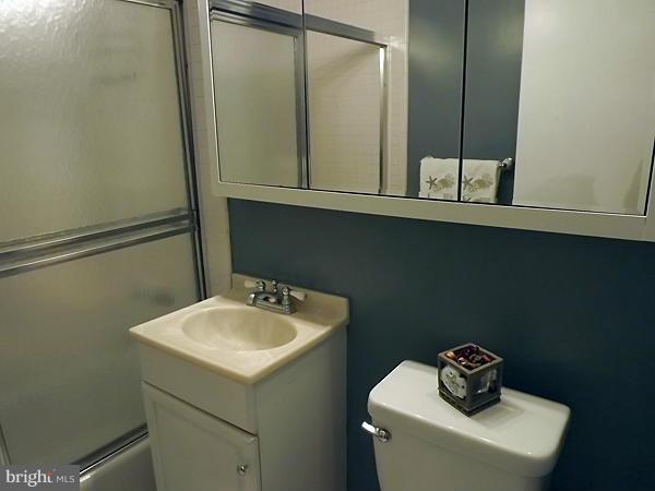 1111 Arlington Boulevard, Unit 437 Arlington, VA 22209 - Photo 7 of 14 a bathroom with a sink and a toilet