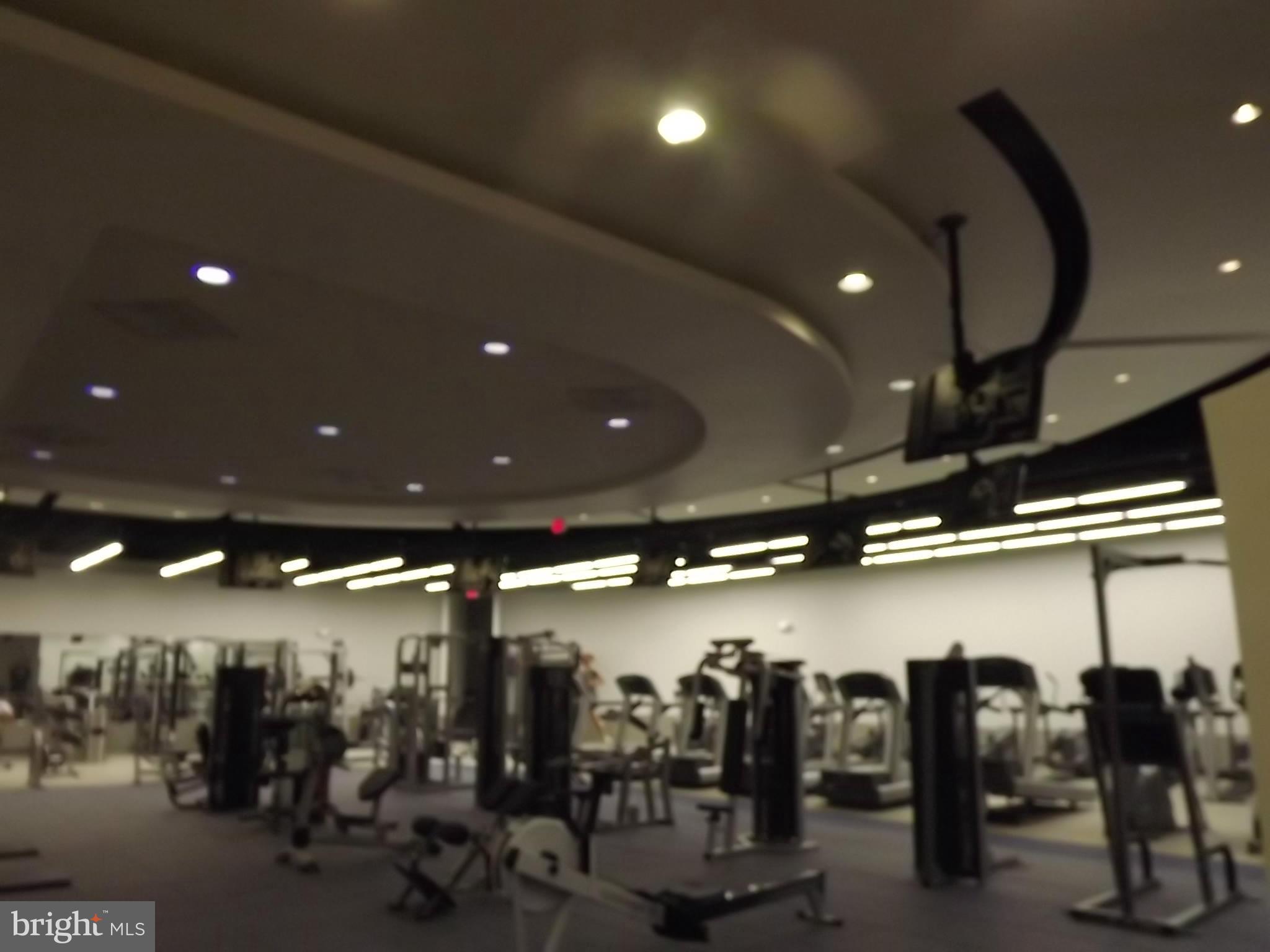 1111 Arlington Boulevard, Unit 437 Arlington, VA 22209 - Photo 10 of 14 a view of a room with gym equipment