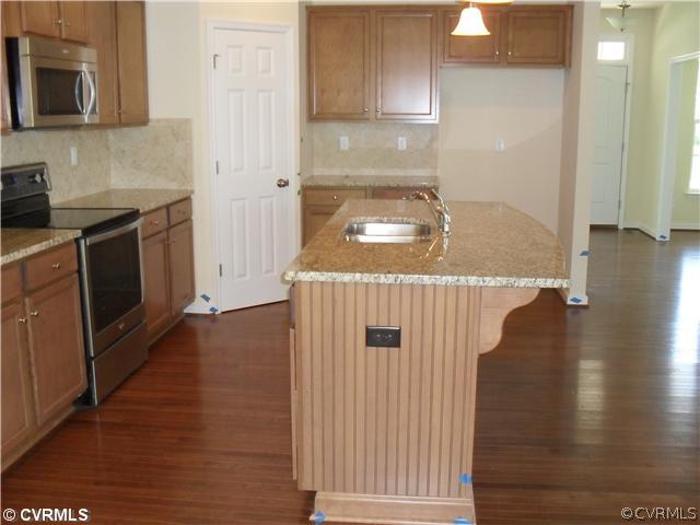 12001 Winterpock Road Chesterfield, VA 23838 - Photo 3 of 6 a view of a kitchen with wooden floor