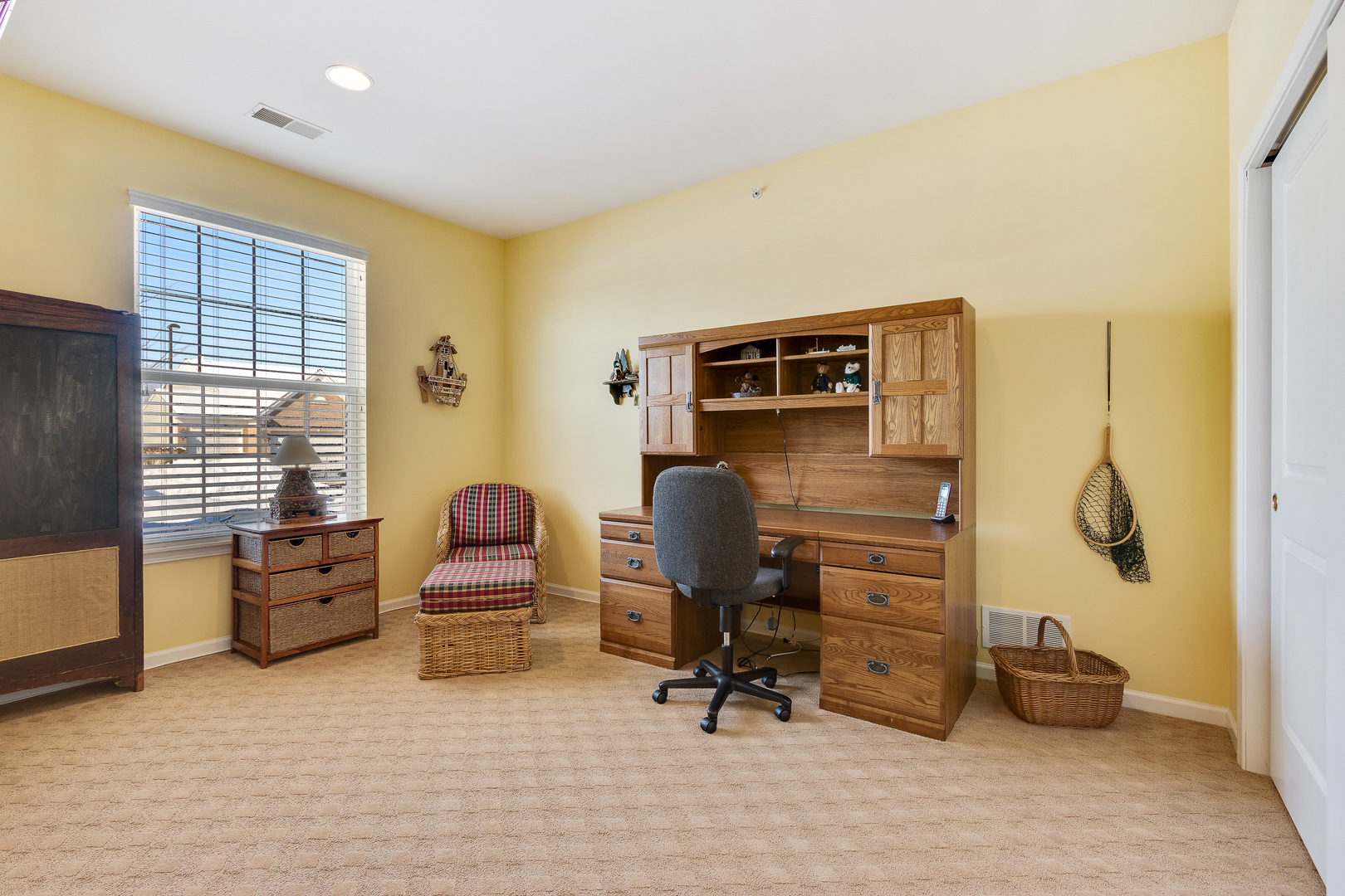 12614 Raintree Path Huntley, IL 60142 - Photo 11 of 28 a bedroom with furniture and a window