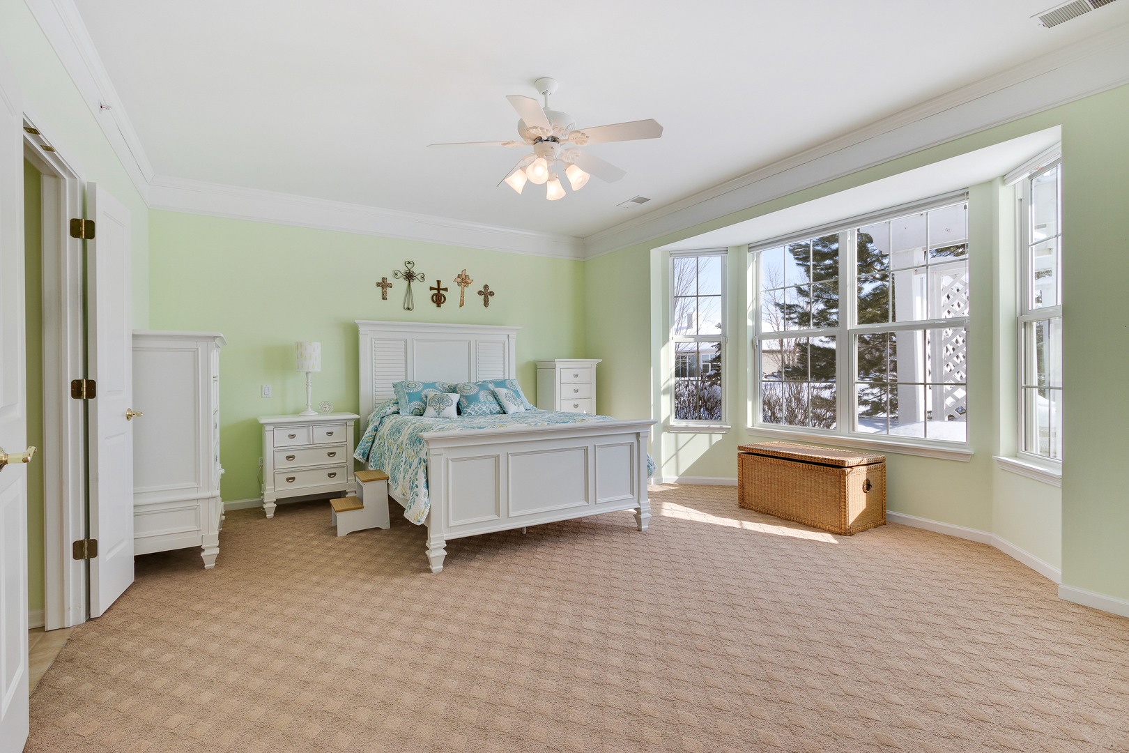 12614 Raintree Path Huntley, IL 60142 - Photo 19 of 28 a very nice looking room with a large window and a chandelier fan