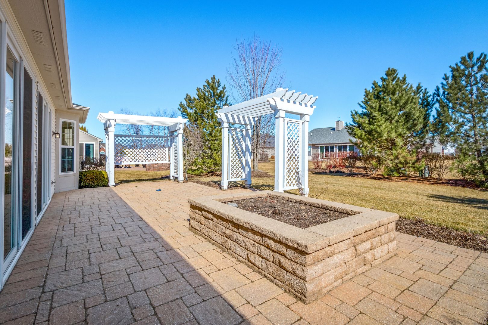 12614 Raintree Path Huntley, IL 60142 - Photo 3 of 28 a front view of a building with pathway