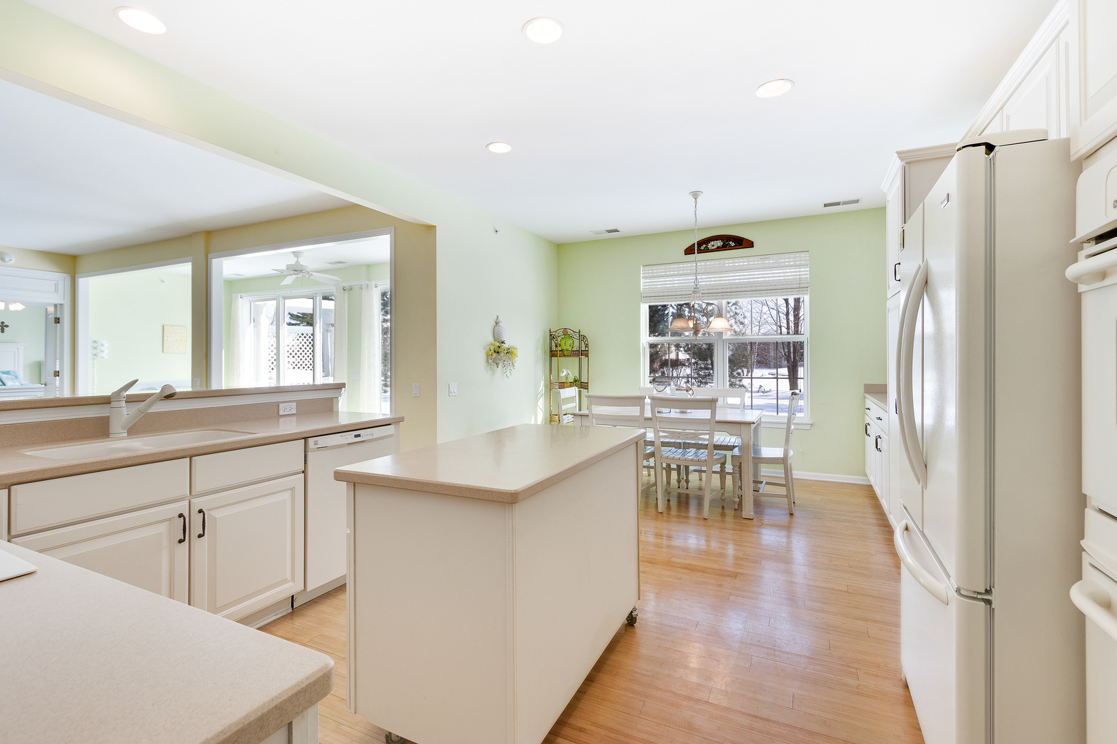 12614 Raintree Path Huntley, IL 60142 - Photo 8 of 28 a kitchen with stainless steel appliances granite countertop a refrigerator and a sink