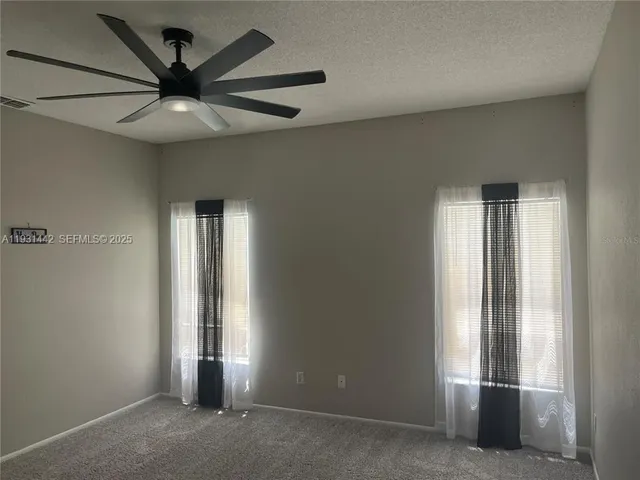 a view of an empty walk in closet