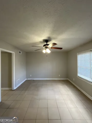 a bathroom with a sink a vanity and a mirror