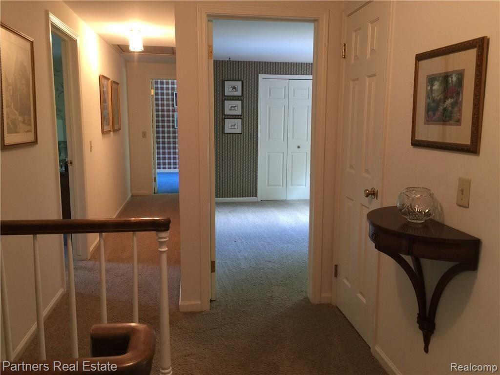4400 Golf Club Road Howell, MI 48843 - Photo 25 of 68 Top of stairs view