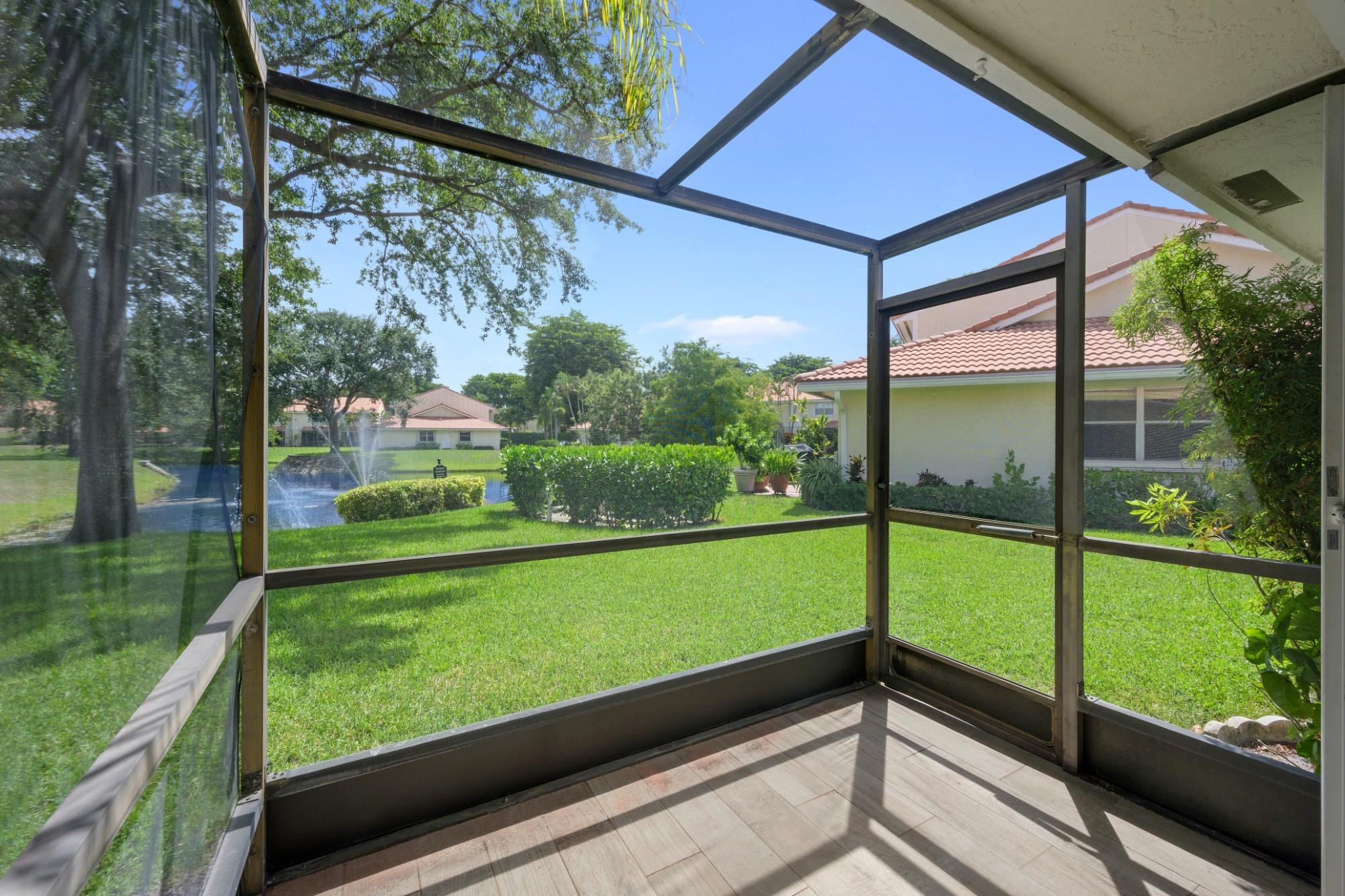 6371 Boca Circle Boca Raton, FL 33433 - Photo 5 of 24 a view of outdoor with a swimming pool
