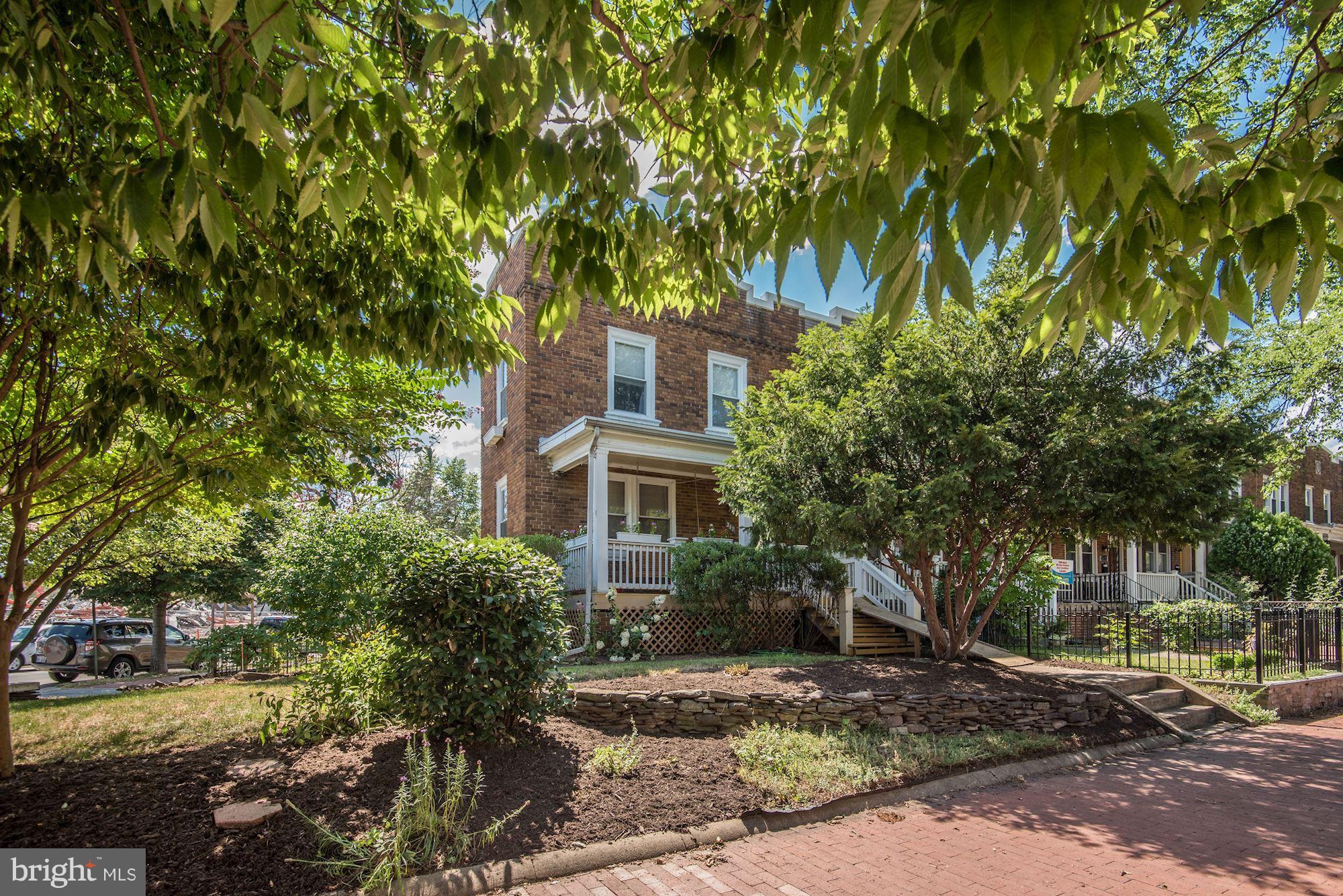 349 Kentucky Avenue Southeast Washington, DC 20003 - Photo 1 of 29 a front view of a house with a yard