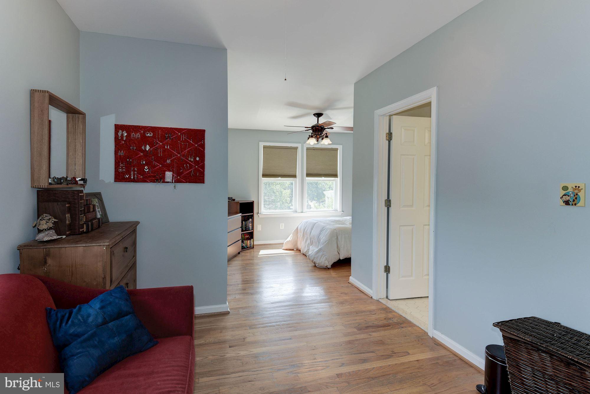 349 Kentucky Avenue Southeast Washington, DC 20003 - Photo 12 of 29 a living room with furniture and a window