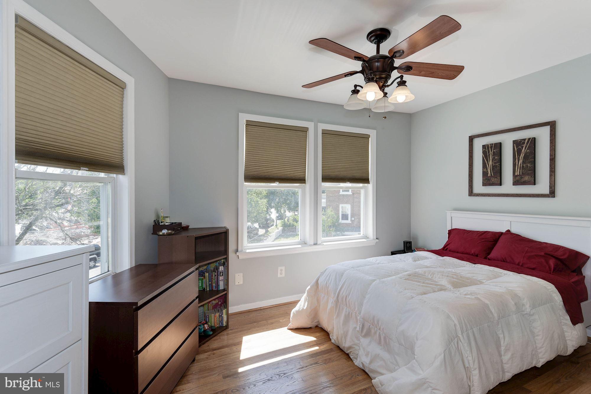 349 Kentucky Avenue Southeast Washington, DC 20003 - Photo 14 of 29 a bedroom with a bed and window