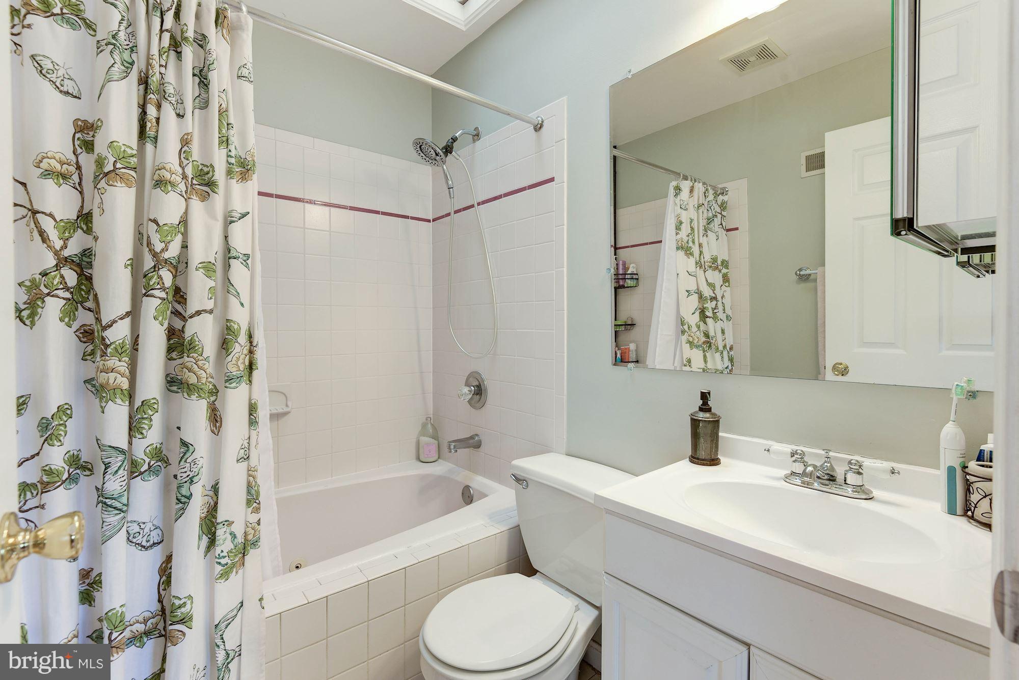 349 Kentucky Avenue Southeast Washington, DC 20003 - Photo 15 of 29 a bathroom with a sink toilet tub and shower