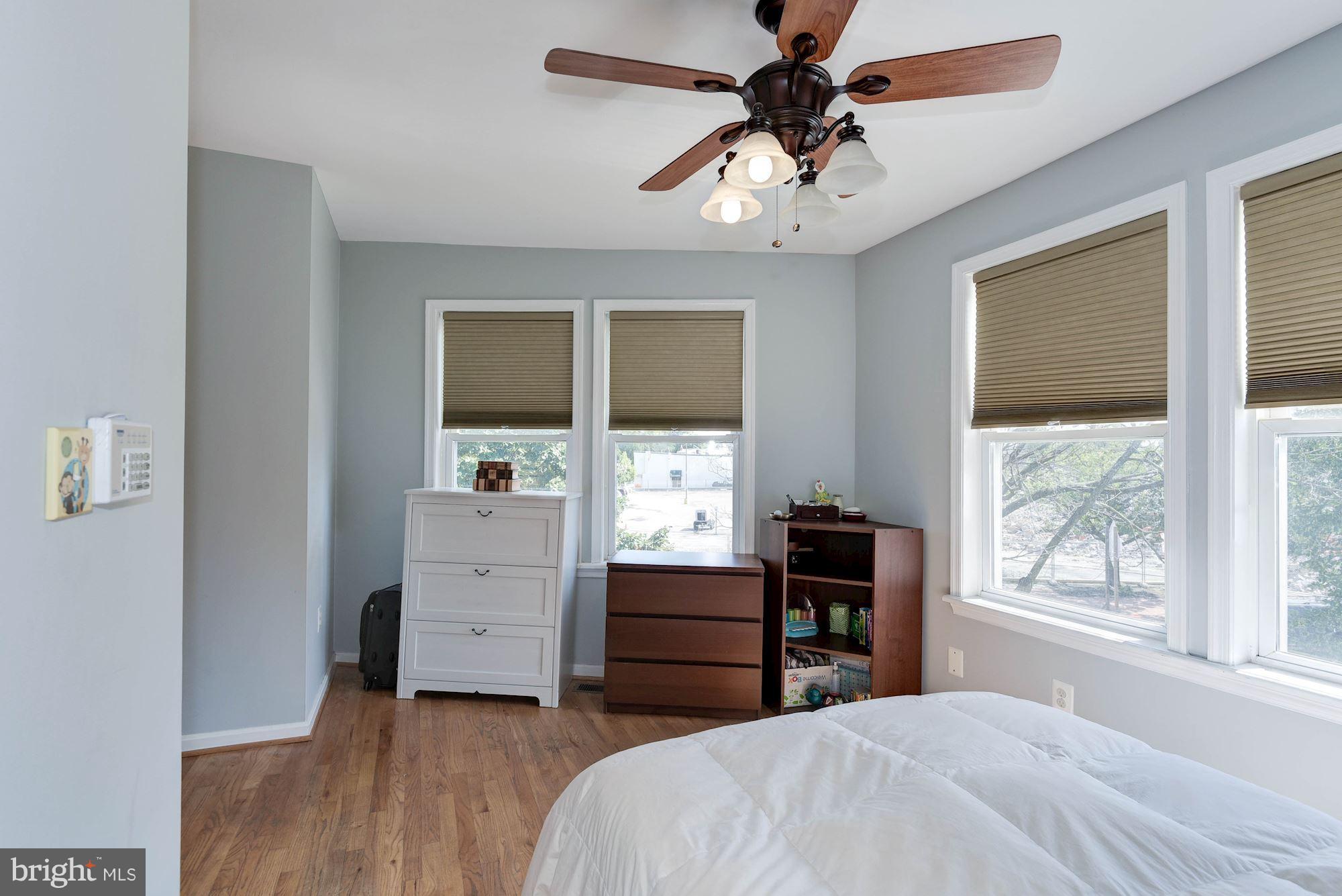 349 Kentucky Avenue Southeast Washington, DC 20003 - Photo 16 of 29 a bedroom with a bed and a window