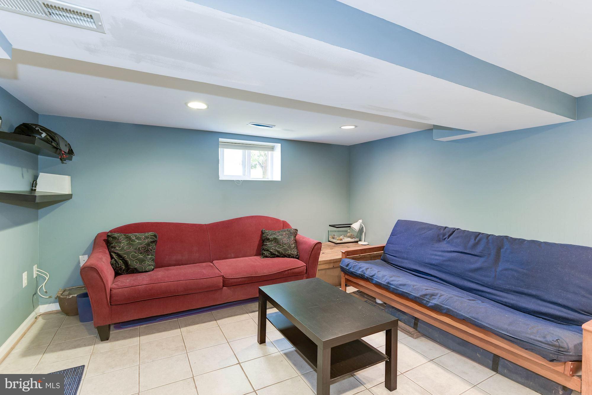 349 Kentucky Avenue Southeast Washington, DC 20003 - Photo 21 of 29 a living room with furniture