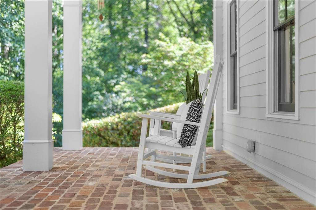 1450 Acworth Due West Road Northwest Kennesaw, GA 30152 - Photo 74 of 77 a view of a patio with table and chairs with wooden floor and plants