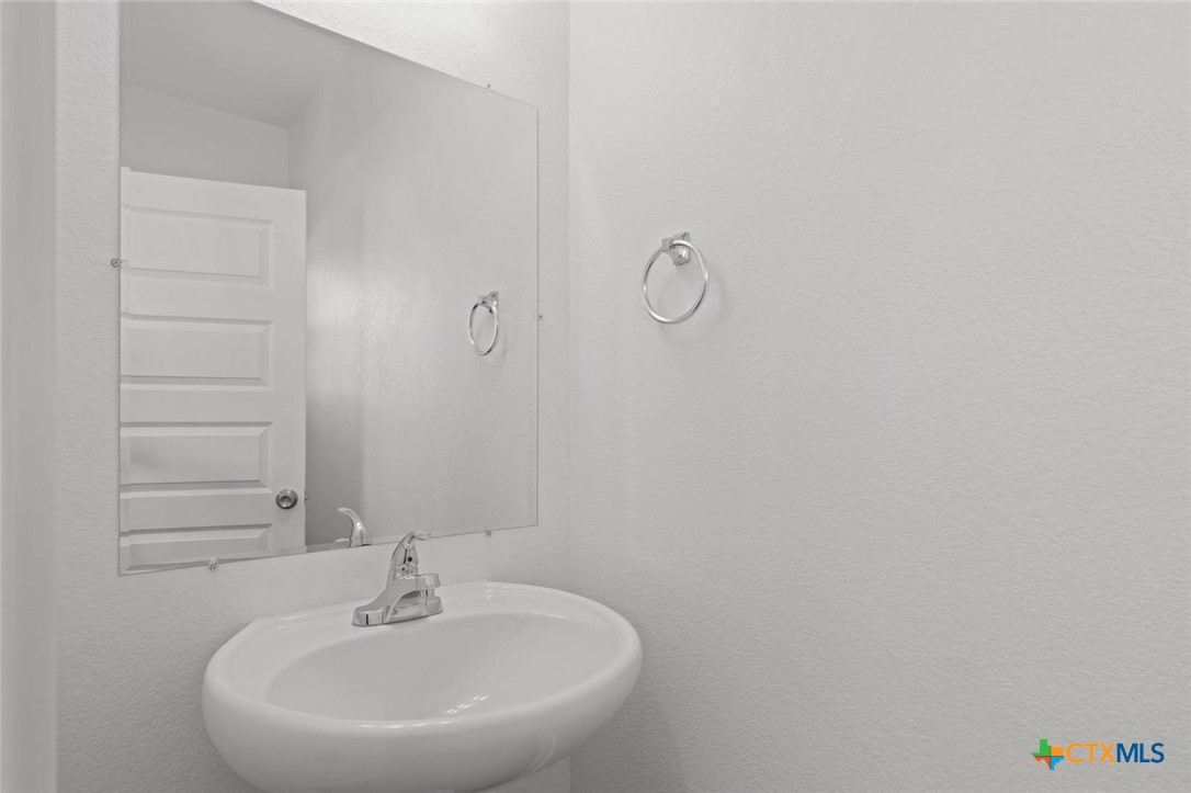 1924 Royal Loop Belton, TX 76513 - Photo 12 of 15 a bathroom with a sink and a mirror