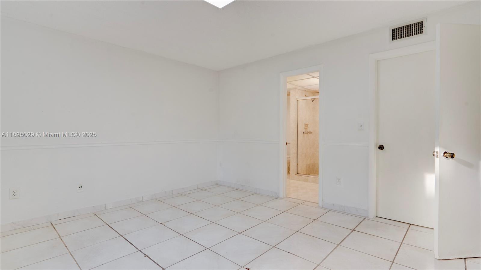 10000 Northwest 80th Court, Unit 2214 Hialeah Gardens, FL 33016 - Photo 11 of 21 a view of an empty room