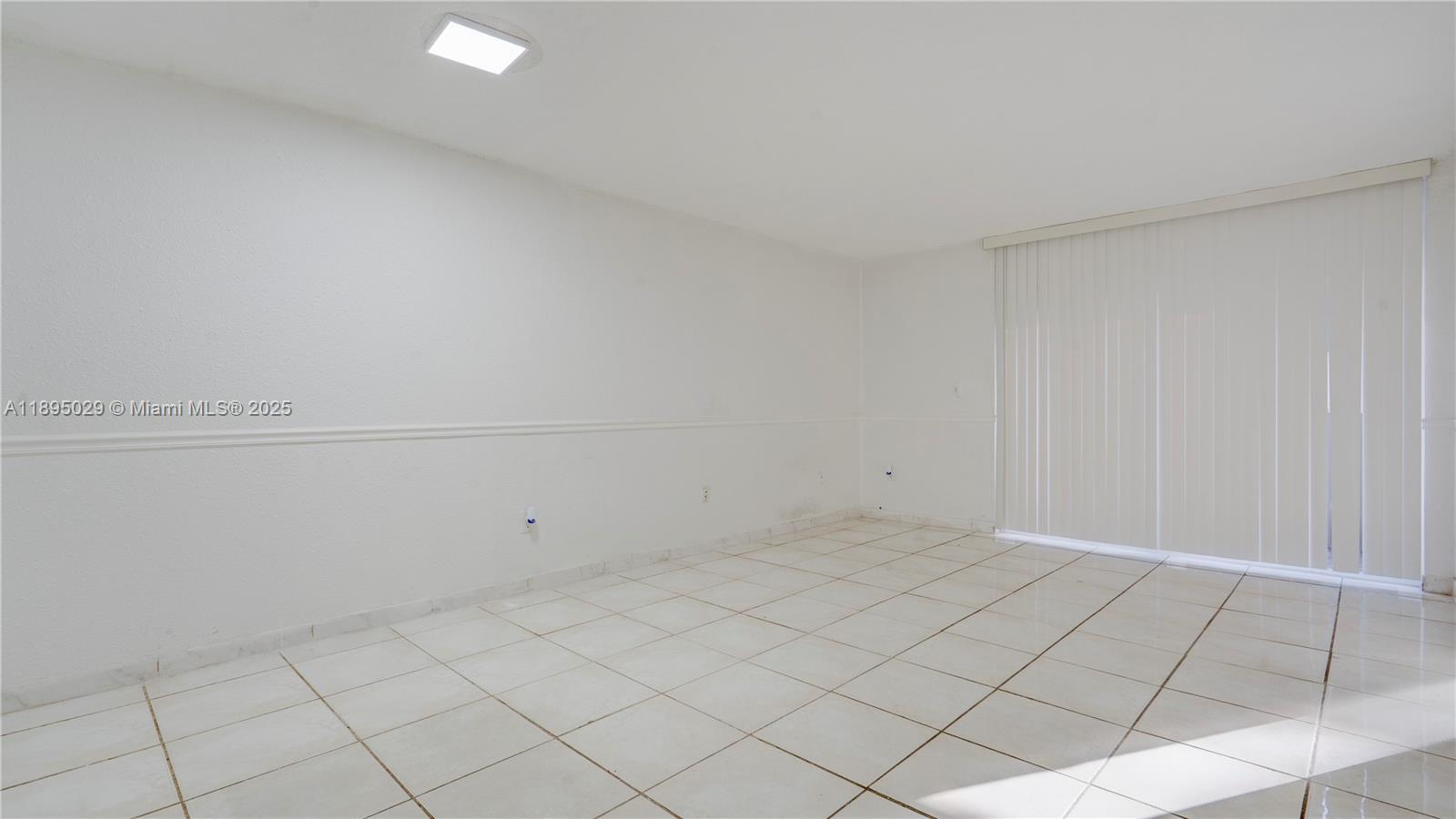 10000 Northwest 80th Court, Unit 2214 Hialeah Gardens, FL 33016 - Photo 14 of 21 a view of an empty room