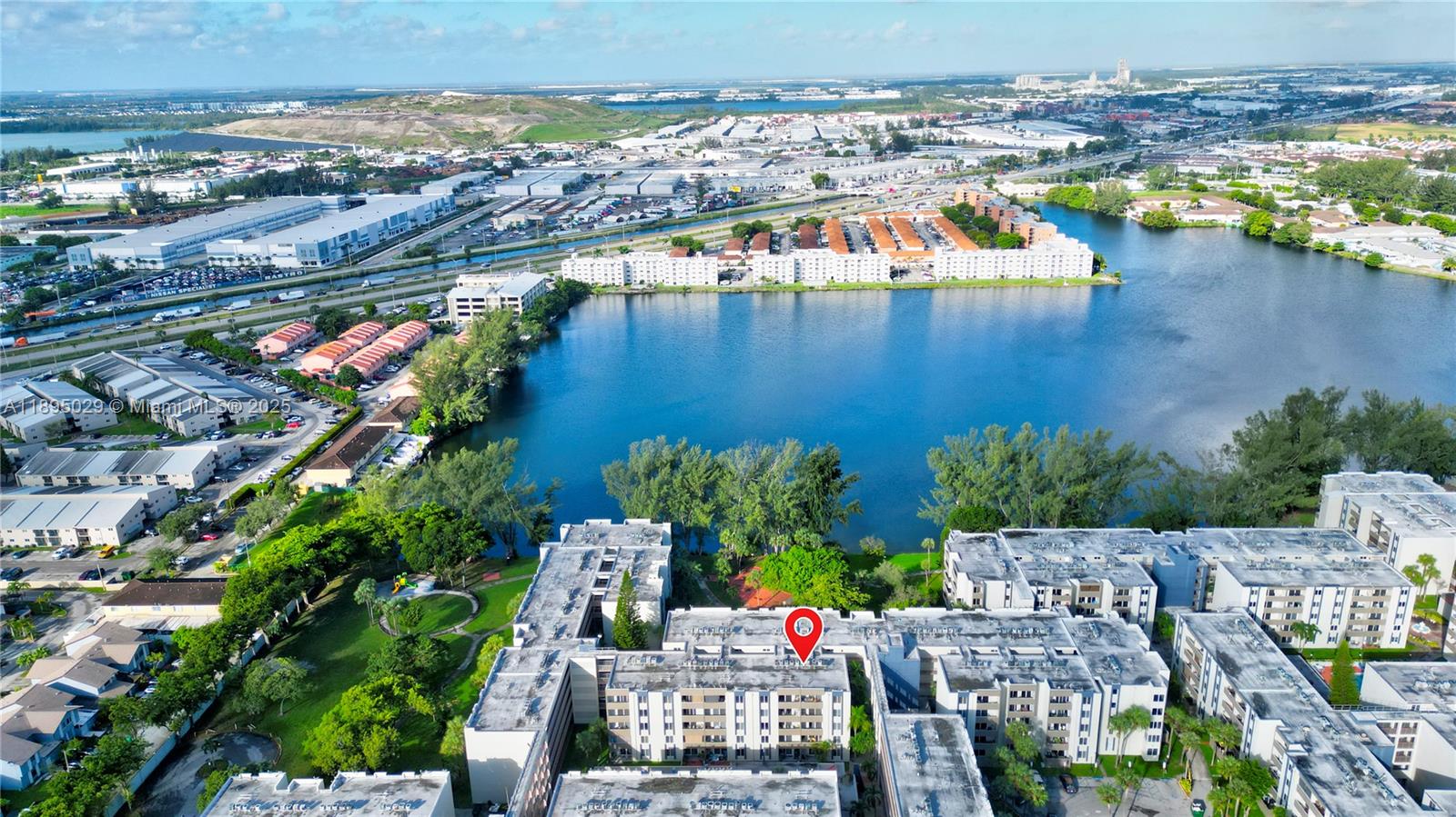 10000 Northwest 80th Court, Unit 2214 Hialeah Gardens, FL 33016 - Photo 3 of 21 a view of a city and lake view