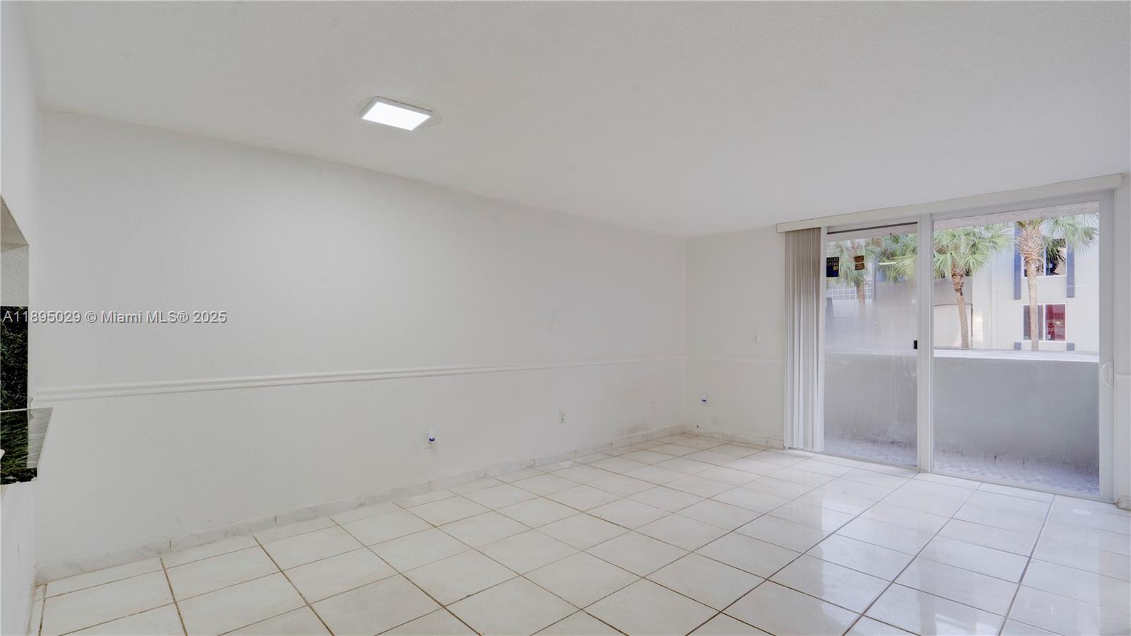 10000 Northwest 80th Court, Unit 2214 Hialeah Gardens, FL 33016 - Photo 8 of 21 a view of an empty room