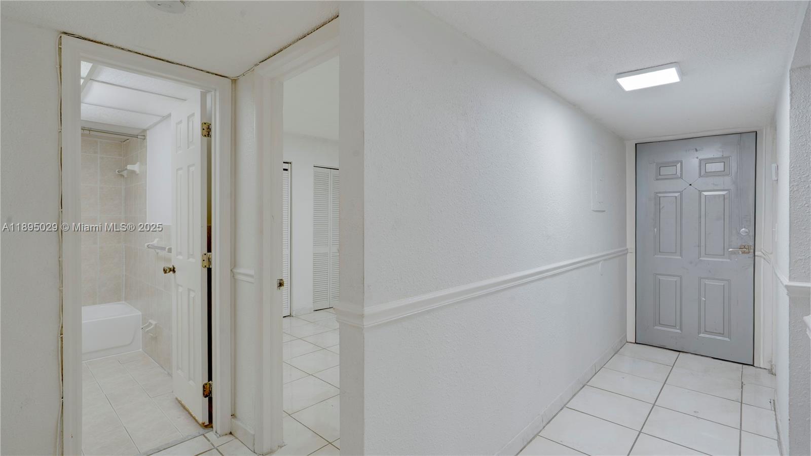 10000 Northwest 80th Court, Unit 2214 Hialeah Gardens, FL 33016 - Photo 10 of 21 a view of an empty room