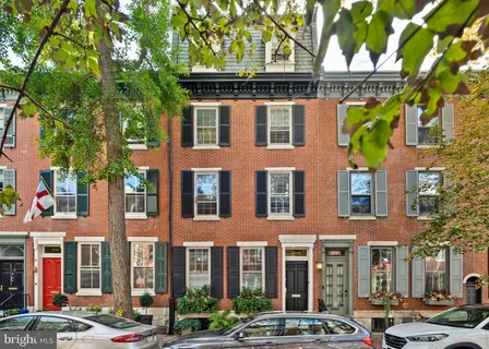 a front view of a building with street view