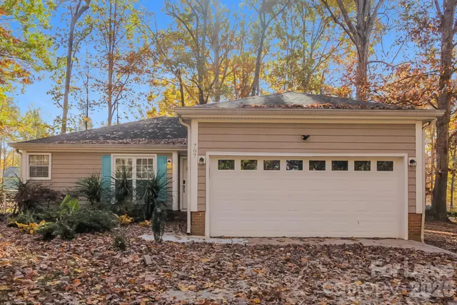 a house with a tree in front of it