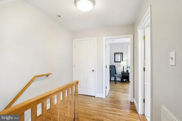 a view of an empty room with stairs