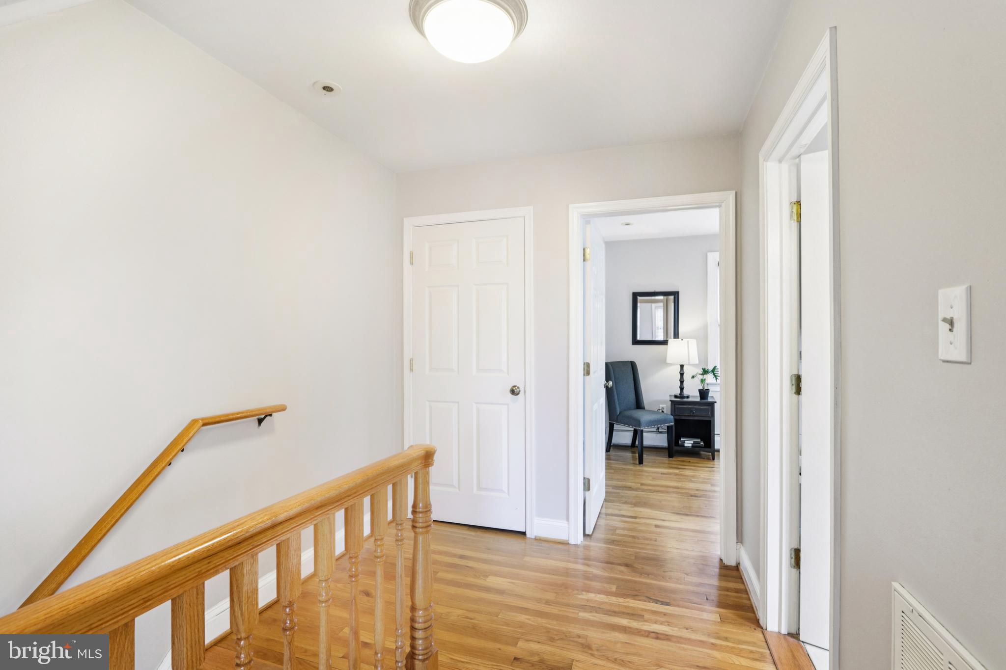 205 North Aberdeen Avenue Wayne, PA 19087 - Photo 20 of 46 a view of a hallway with wooden floor and closet